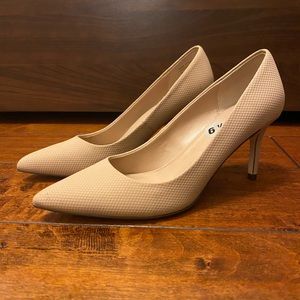 Blush pink pointed toe pumps
